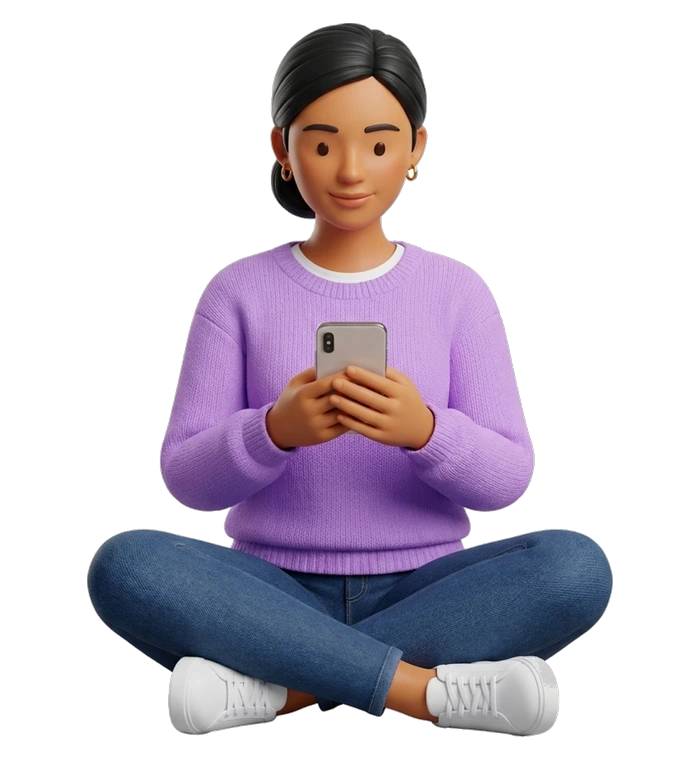a woman sitting cross-legged, looking at her phone