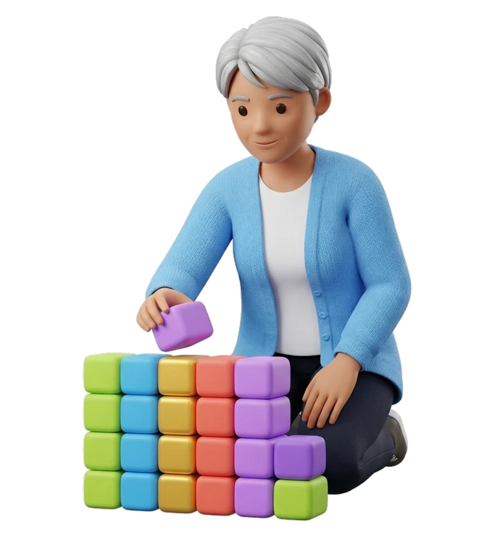 a woman with silver hair stacking coloured blocks, one for each theme in the fund